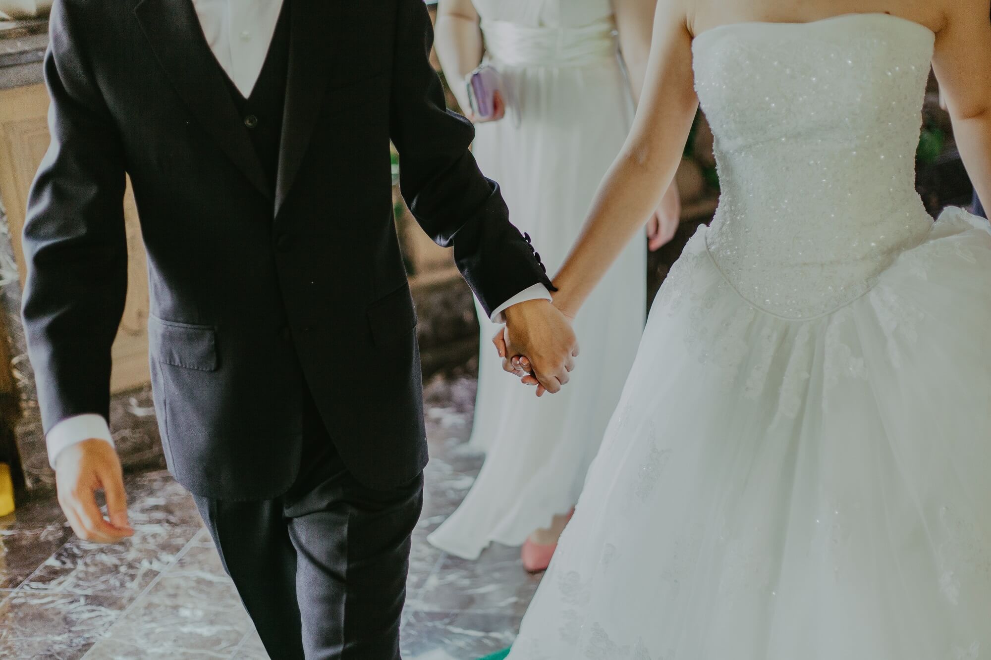 Bride and groom walking after getting married